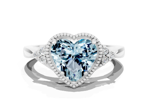 White gold Heart Cut Aquamarine Halo Ring with Tapered Band and Four-Prong Setting