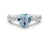 White gold Heart Cut Aquamarine Prong Setting with Side Stones on a Pave Band