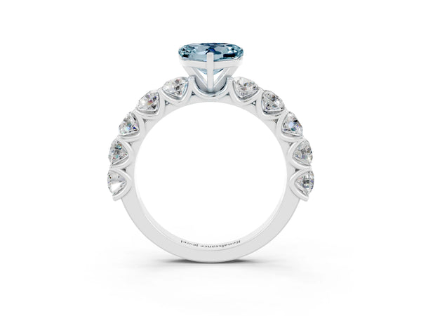 Platinum Heart Cut Aquamarine Prong Setting with Side Stones on a Pave Band