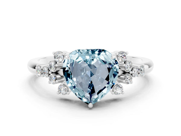 White gold Heart Cut Aquamarine Ring with Side Stones and Four-Prong Setting