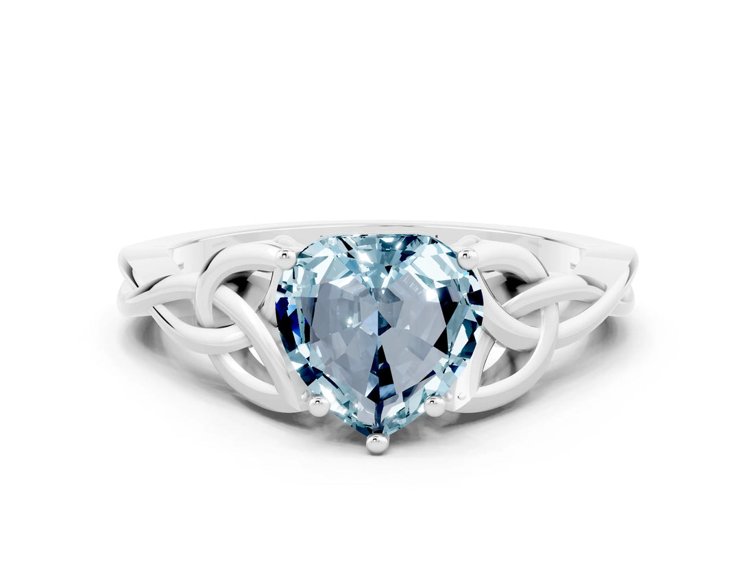 White gold Heart Cut Aquamarine Solitaire Engagement Ring with Celtic Knot Band and Four-Prong Setting
