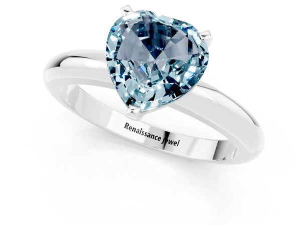 Silver Heart Cut Aquamarine Solitaire Engagement Ring with Round Band and Four-Prong Setting