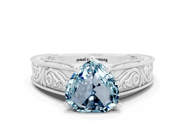Silver Heart Cut Aquamarine Solitaire Ring with Engraved Band and Four-Prong Setting