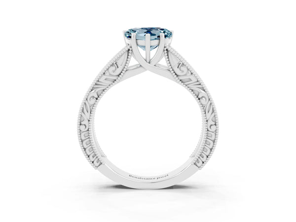 Platinum Heart Cut Aquamarine Solitaire Ring with Engraved Band and Four-Prong Setting