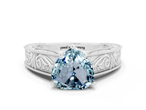 White gold Heart Cut Aquamarine Solitaire Ring with Engraved Band and Four-Prong Setting
