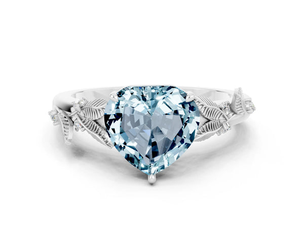 Silver Heart Cut Aquamarine Solitaire Ring with Leaf Motif Band and Four-Prong Setting