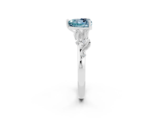 Silver Heart Cut Aquamarine Solitaire Ring with Leaf Motif Band and Four-Prong Setting