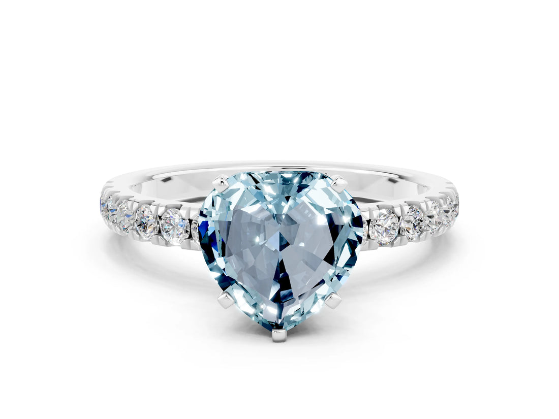 White gold Heart Cut Aquamarine Solitaire Ring with Pavé Accents and Four-Prong Setting