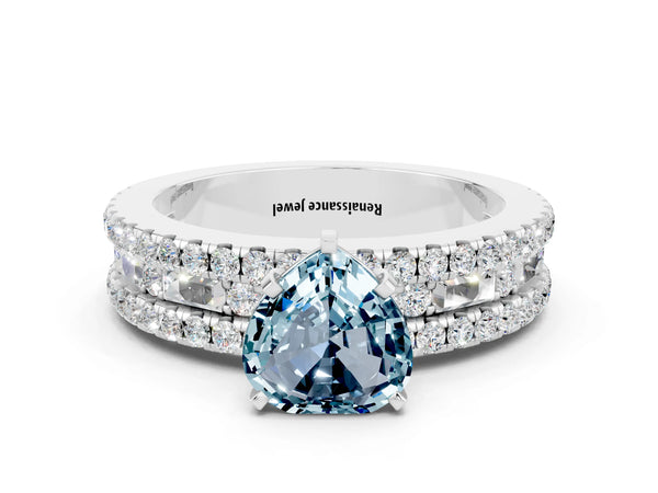 White gold Heart Cut Aquamarine Solitaire Ring with Pavé and Channel Set Band