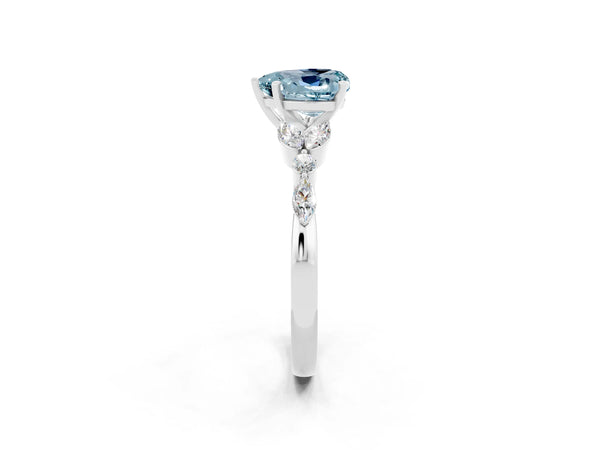 Platinum Heart Cut Aquamarine Solitaire Ring with Side Stones and Four-Prong Setting