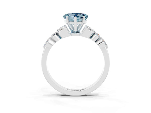 Platinum Heart Cut Aquamarine Solitaire Ring with Side Stones and Four-Prong Setting