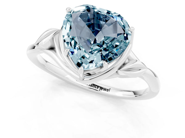 Platinum Heart Cut Aquamarine Solitaire Ring with Twist Band and Four-Prong Setting