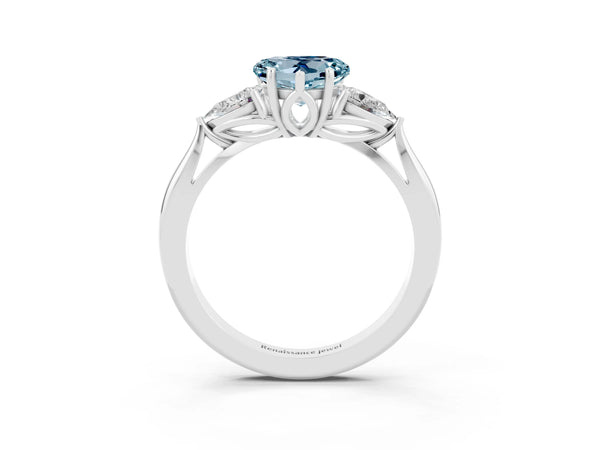 Platinum Heart Cut Aquamarine Three-Stone Ring with Pear  Side Stones and Prong Setting