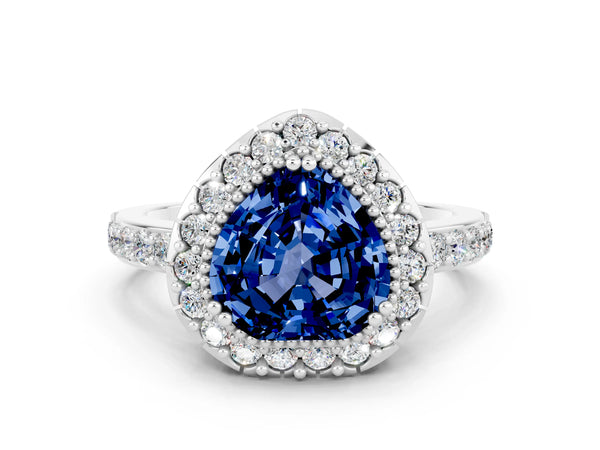 White gold Heart Cut Blue Sapphire Halo Ring with Pavé Band and Prong Setting