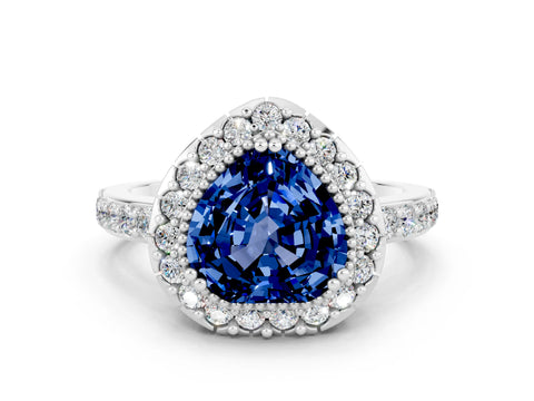 White gold Heart Cut Blue Sapphire Halo Ring with Pavé Band and Prong Setting