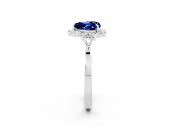 Platinum Heart Cut Blue Sapphire Halo Ring with Pear Side Stones and Prong Setting