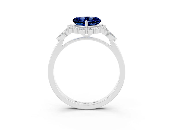 Platinum Heart Cut Blue Sapphire Halo Ring with Pear Side Stones and Prong Setting