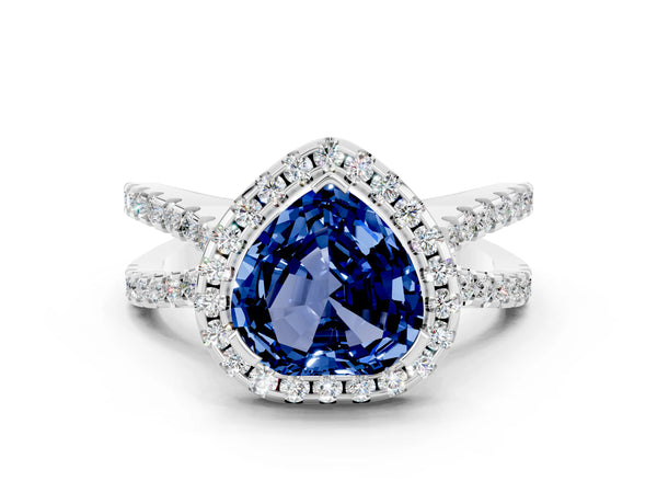 Platinum Heart Cut Blue Sapphire Halo Ring with Split Shank Pavé Band and Prong Setting