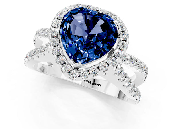 White gold Heart Cut Blue Sapphire Halo Ring with Split Shank Pavé Band and Prong Setting