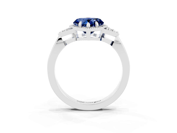Platinum Heart Cut Blue Sapphire Halo Ring with Tapered Band and Four-Prong Setting