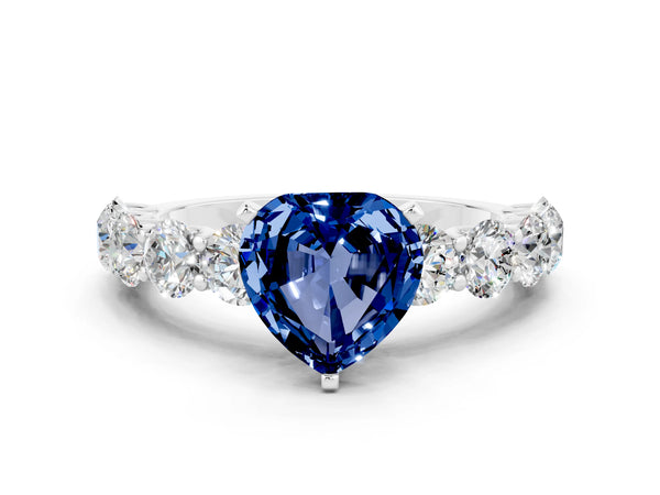 Silver Heart Cut Blue Sapphire Prong Setting with Side Stones on a Pave Band