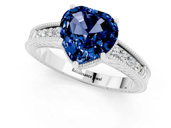 White gold Heart Cut Blue Sapphire Ring with Milgrain Pavé Band and Four-Prong Setting