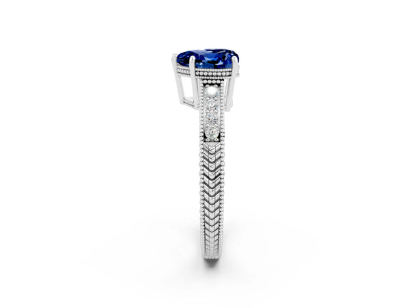 White gold Heart Cut Blue Sapphire Ring with Milgrain Pavé Band and Four-Prong Setting