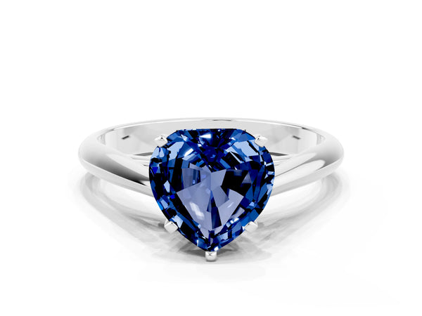 Platinum Heart Cut Blue Sapphire Solitaire Engagement Ring with Cathedral Setting and Four-Prong Mount