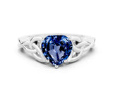 White gold Heart Cut Blue Sapphire Solitaire Engagement Ring with Celtic Knot Band and Four-Prong Setting