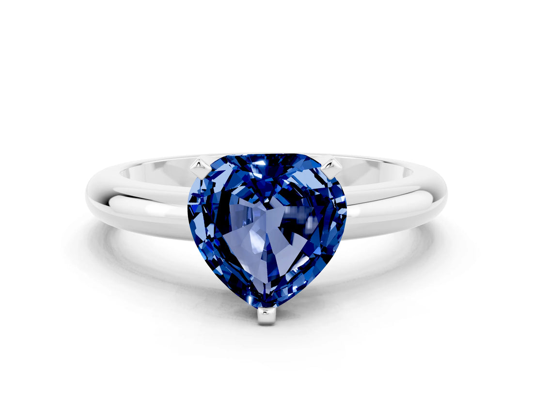 White gold Heart Cut Blue Sapphire Solitaire Engagement Ring with Round Band and Four-Prong Setting