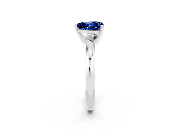 Silver Heart Cut Blue Sapphire Solitaire Engagement Ring with Round Band and Four-Prong Setting