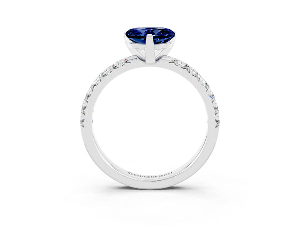 Platinum Heart Cut Blue Sapphire Solitaire Pavé Engagement Ring with Round Band and Prong Setting