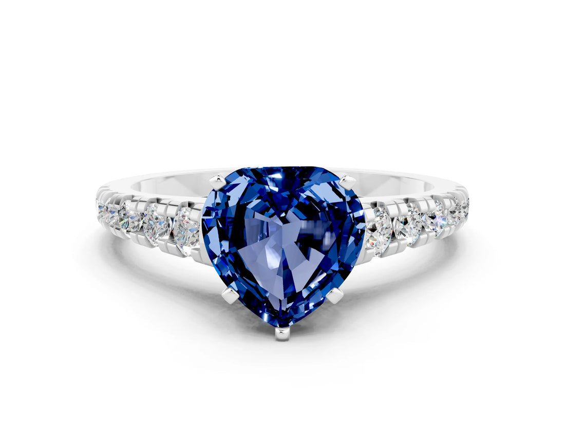 White gold Heart Cut Blue Sapphire Solitaire Ring with Cathedral Setting and Pavé Band