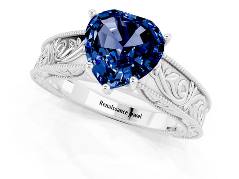 White gold Heart Cut Blue Sapphire Solitaire Ring with Engraved Band and Four-Prong Setting_1
