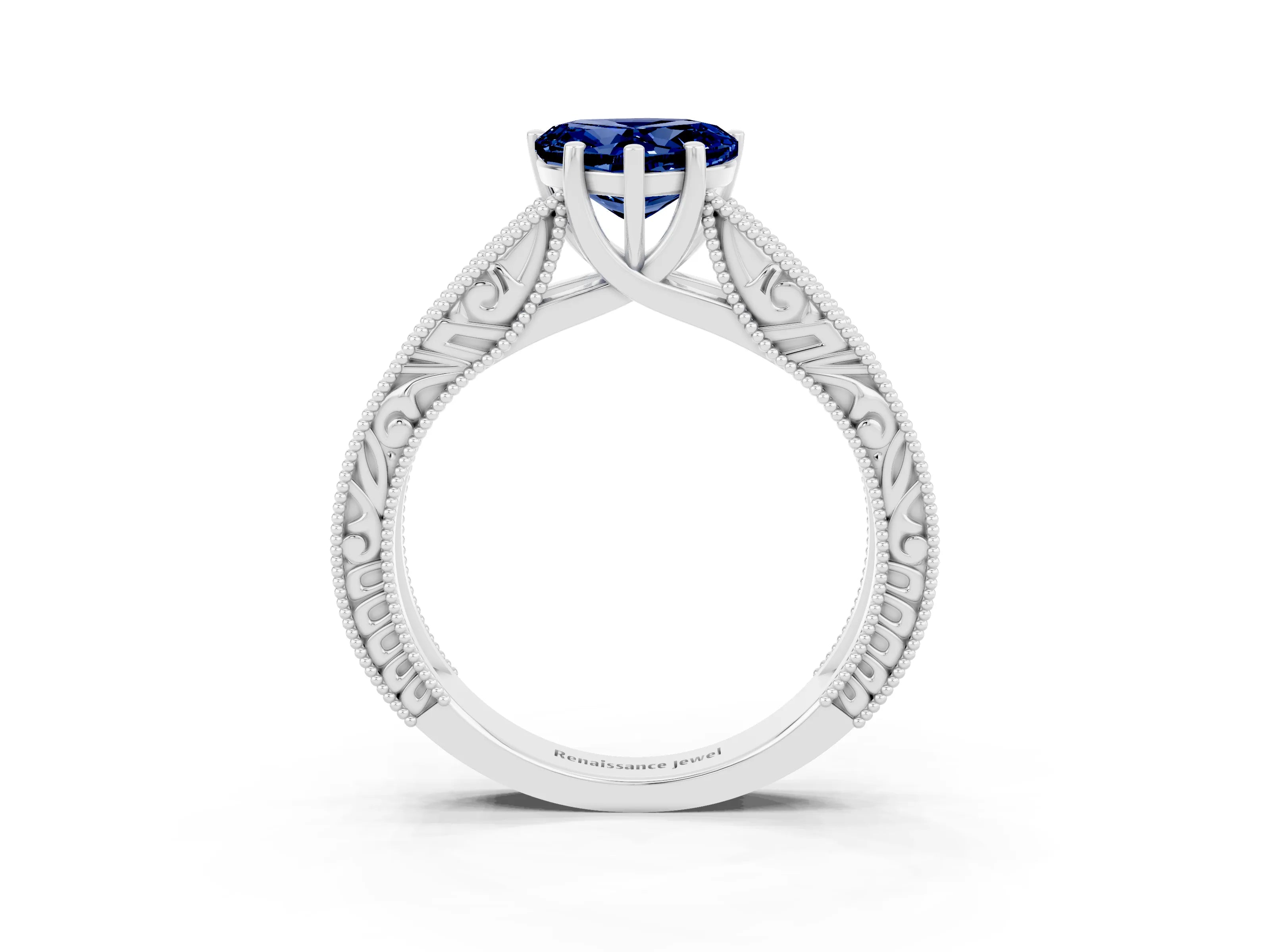 White gold Heart Cut Blue Sapphire Solitaire Ring with Engraved Band and Four-Prong Setting_3