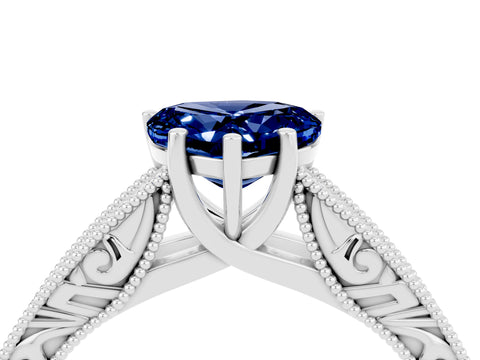 White gold Heart Cut Blue Sapphire Solitaire Ring with Engraved Band and Four-Prong Setting_4