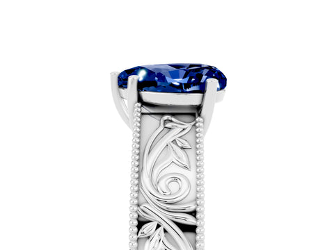 White gold Heart Cut Blue Sapphire Solitaire Ring with Engraved Band and Four-Prong Setting_5