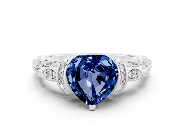 Platinum Heart Cut Blue Sapphire Solitaire Ring with Filigree Band and Four-Prong Setting