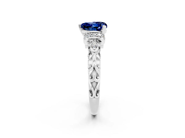 Silver Heart Cut Blue Sapphire Solitaire Ring with Filigree Band and Four-Prong Setting