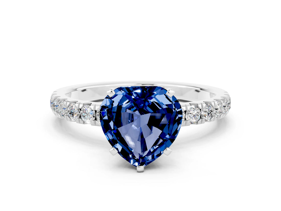 White gold Heart Cut Blue Sapphire Solitaire Ring with Pavé Accents and Four-Prong Setting