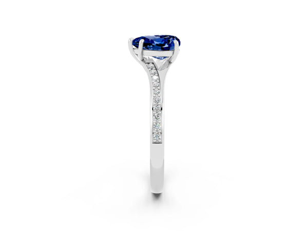 White gold Heart Cut Blue Sapphire Solitaire Ring with Pavé Band and Prong Setting
