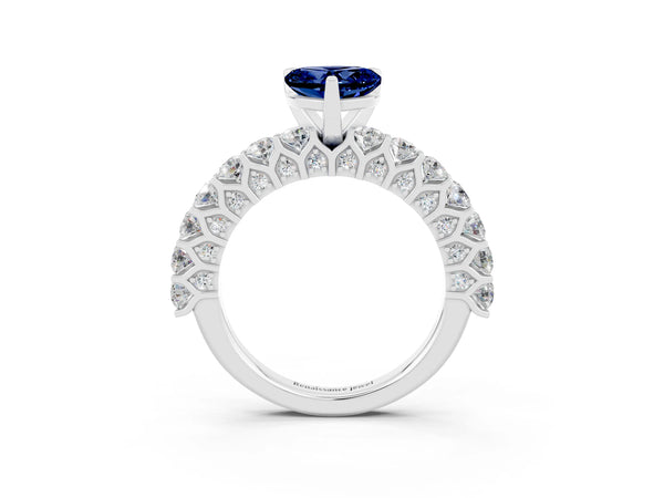 Silver Heart Cut Blue Sapphire Solitaire Ring with Shared Prong Pavé Band and Four-Prong Setting