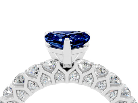White gold Heart Cut Blue Sapphire Solitaire Ring with Shared Prong Pavé Band and Four-Prong Setting_16
