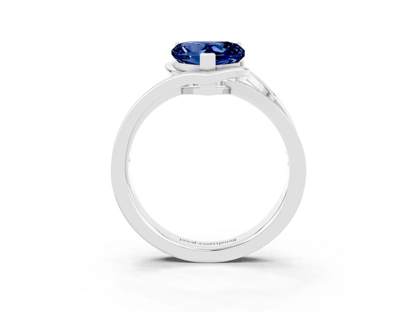 Platinum Heart Cut Blue Sapphire Solitaire Ring with Split Shank and Prong Setting