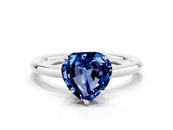White gold Heart Cut Blue Sapphire Solitaire Ring with Thin Band and Four-Prong Setting
