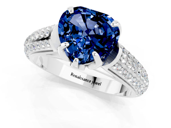 Platinum Heart Cut Blue Sapphire Solitaire Ring with Three-Row Pavé Band and Four-Prong Setting