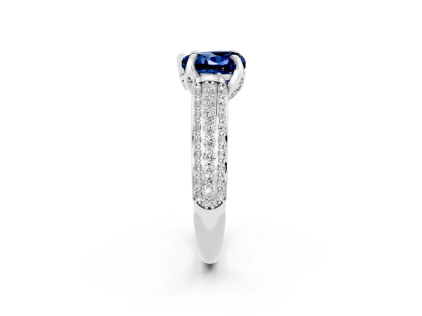 Platinum Heart Cut Blue Sapphire Solitaire Ring with Three-Row Pavé Band and Four-Prong Setting