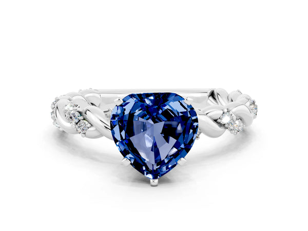 Platinum Heart Cut Blue Sapphire Solitaire Ring with Twisted Band and Pavé Accents