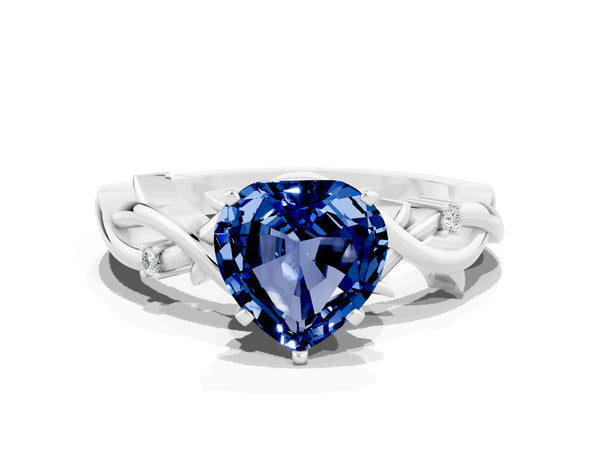 White gold Heart Cut Blue Sapphire Solitaire Ring with Twisted Band and Prong Setting