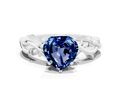White gold Heart Cut Blue Sapphire Solitaire Ring with Twisted Band and Prong Setting